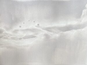 Arc floating over a Creme brown landscape